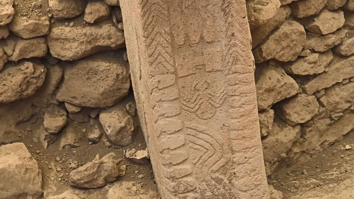 Close view of relief carvings on a limestone pillar in Building D at Göbekli Tepe.