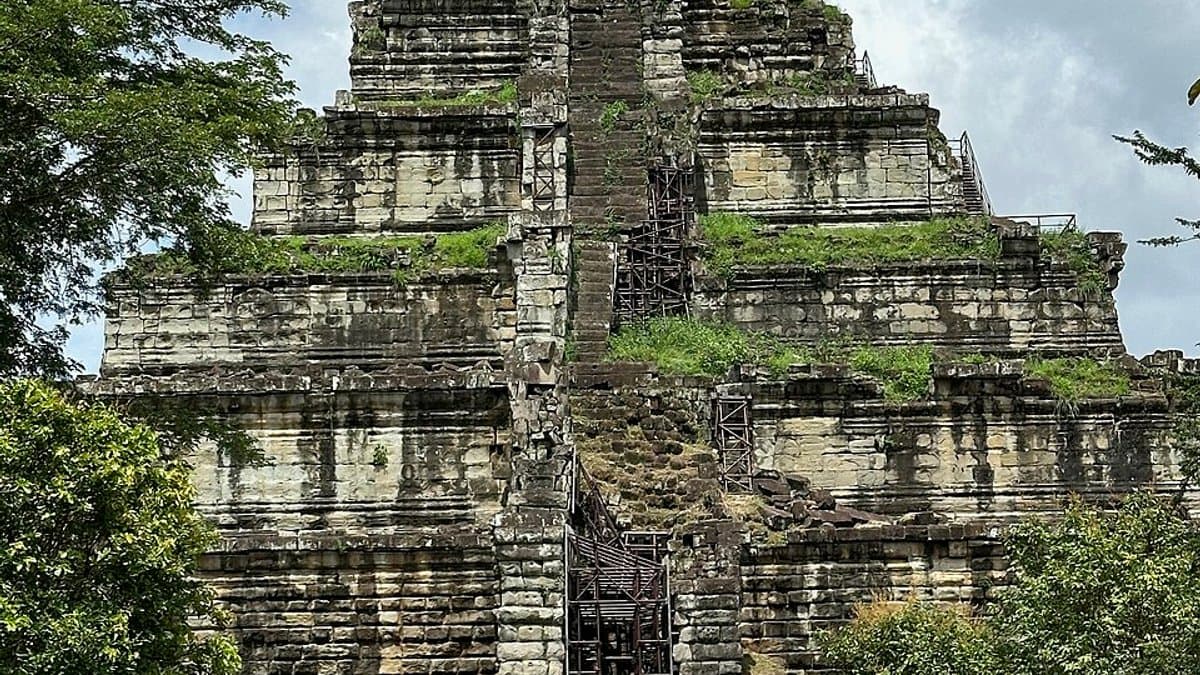 Stepped temple pyramid of Prasat Thom rising amid forest at Koh Ker.