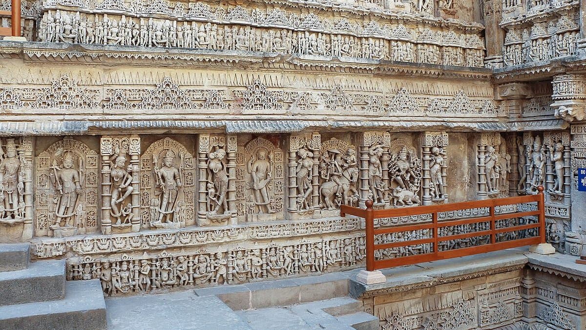 Ornately carved stone wall and landing within the Rani-ki-Vav stepwell.