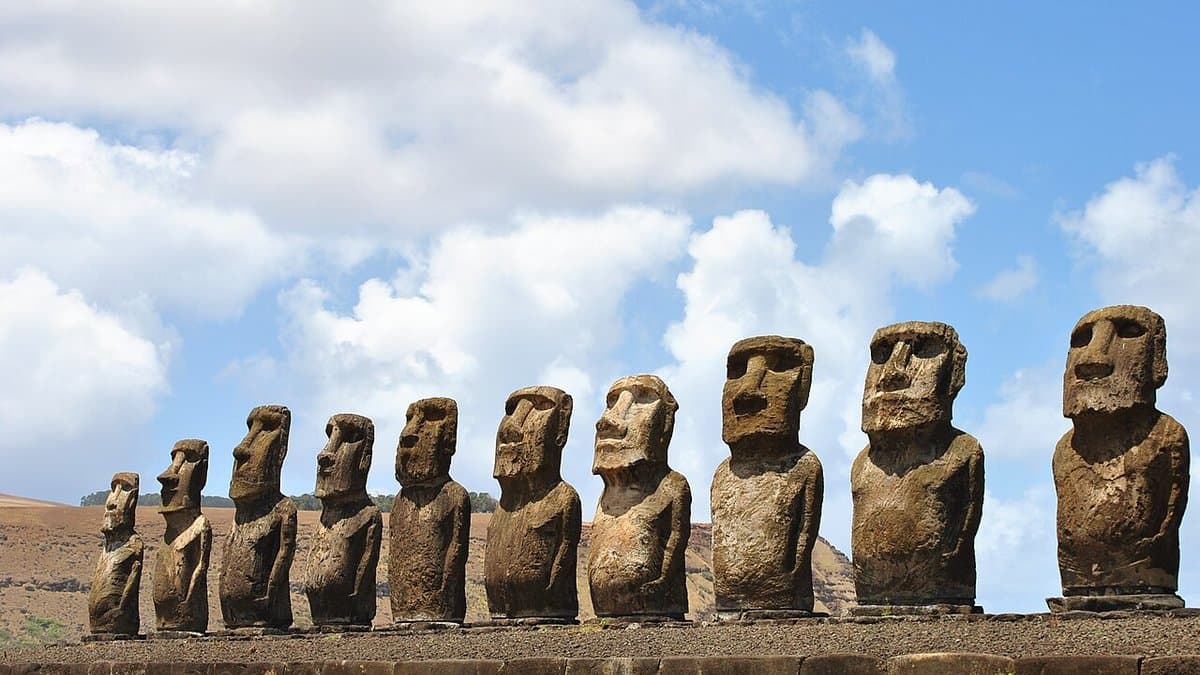 Line of standing moai on the restored Ahu Tongariki platform on Rapa Nui.