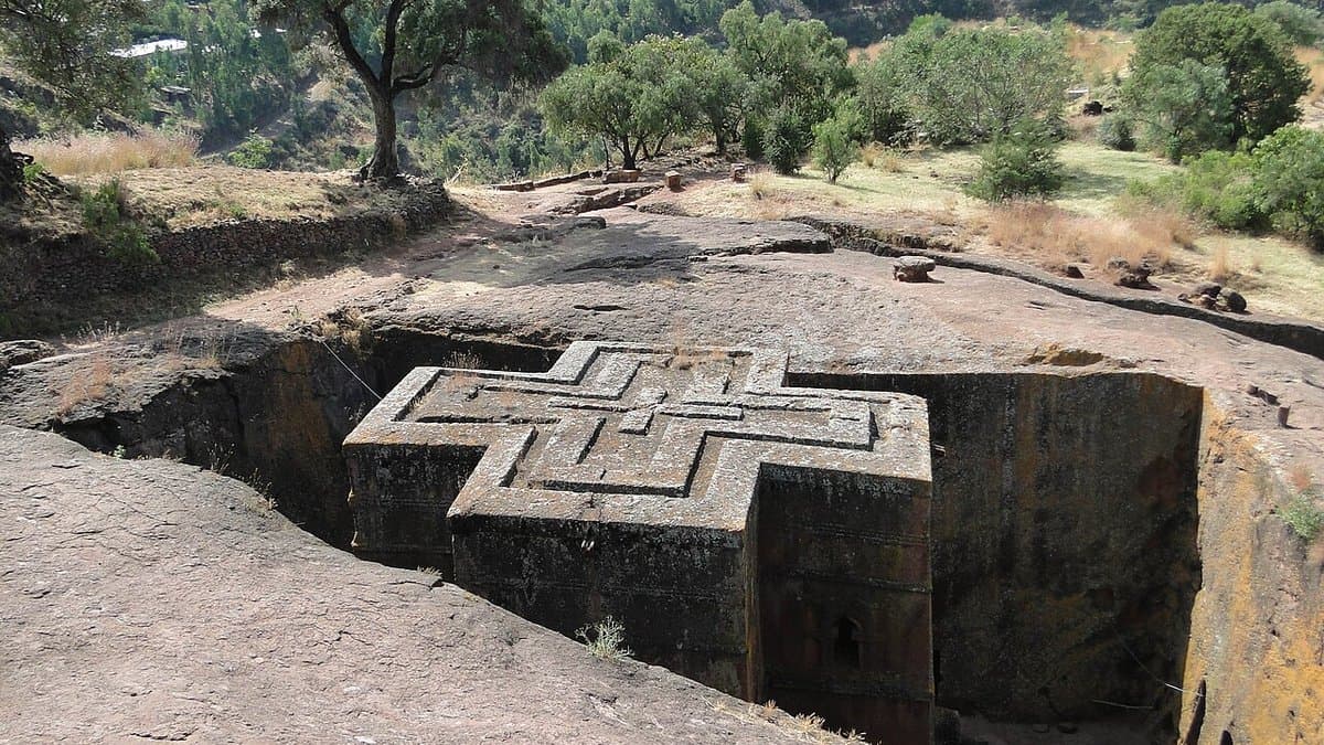 Cross-shaped roof of Biete Giyorgis within a deep rock-cut courtyard at Lalibela.