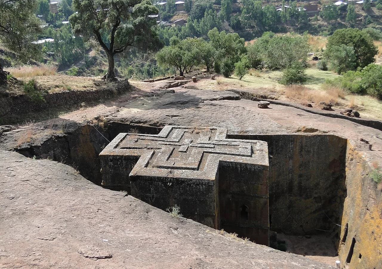 Cross-shaped roof of Biete Giyorgis within a deep rock-cut courtyard at Lalibela.