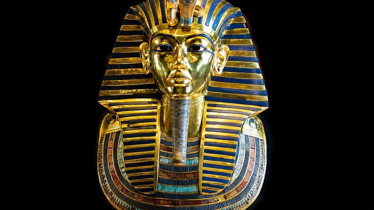 The famous burial mask of King Tutankhamun on display at the Egyptian Museum in Cairo, Egypt. The 24 pound (11 kilogram) mask is made of gold, glass