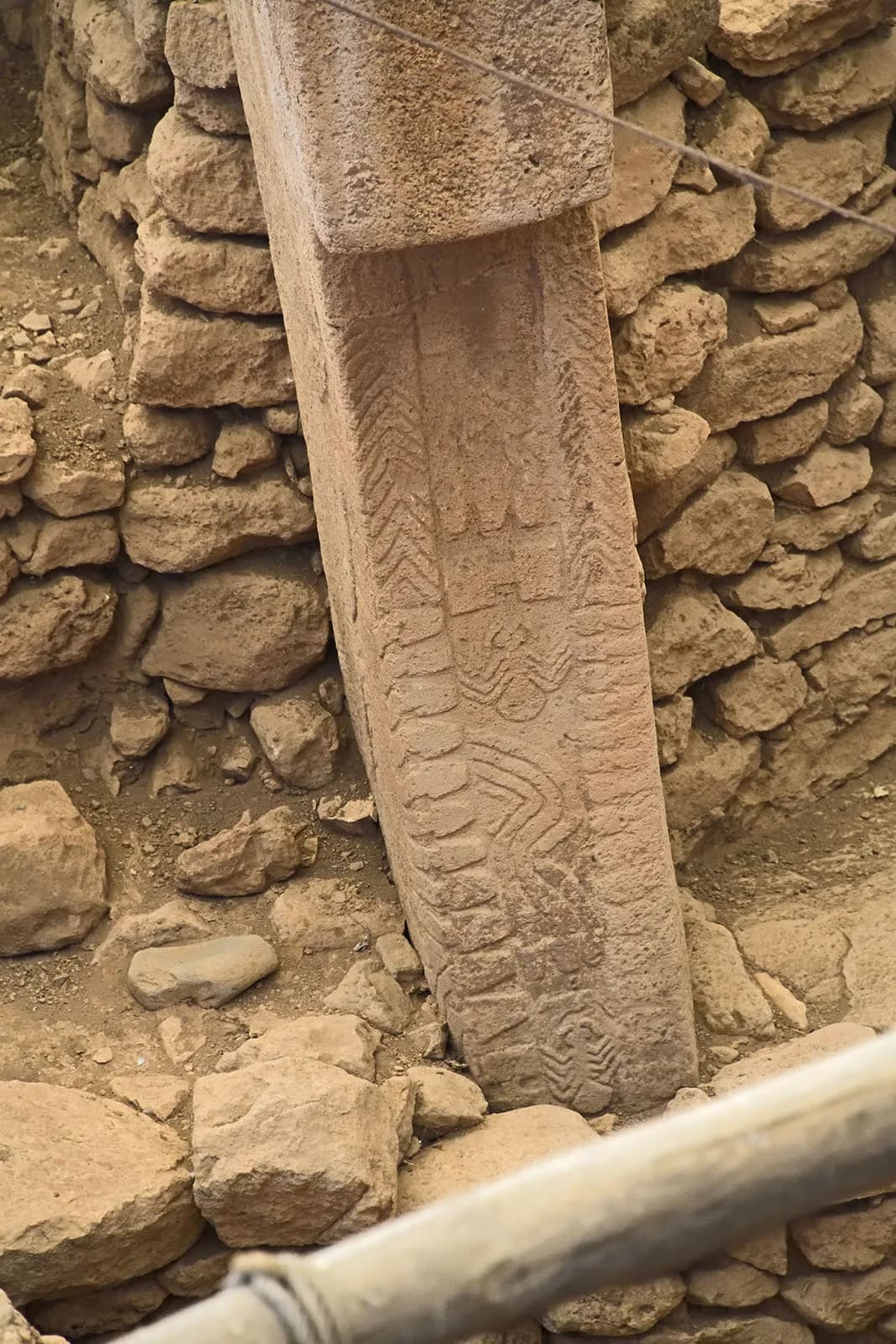 Close view of relief carvings on a limestone pillar in Building D at Göbekli Tepe.