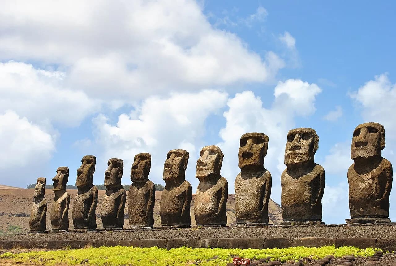 Line of standing moai on the restored Ahu Tongariki platform on Rapa Nui.